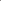 White flat shoes with decorative elements worn with gray pants on a gray background